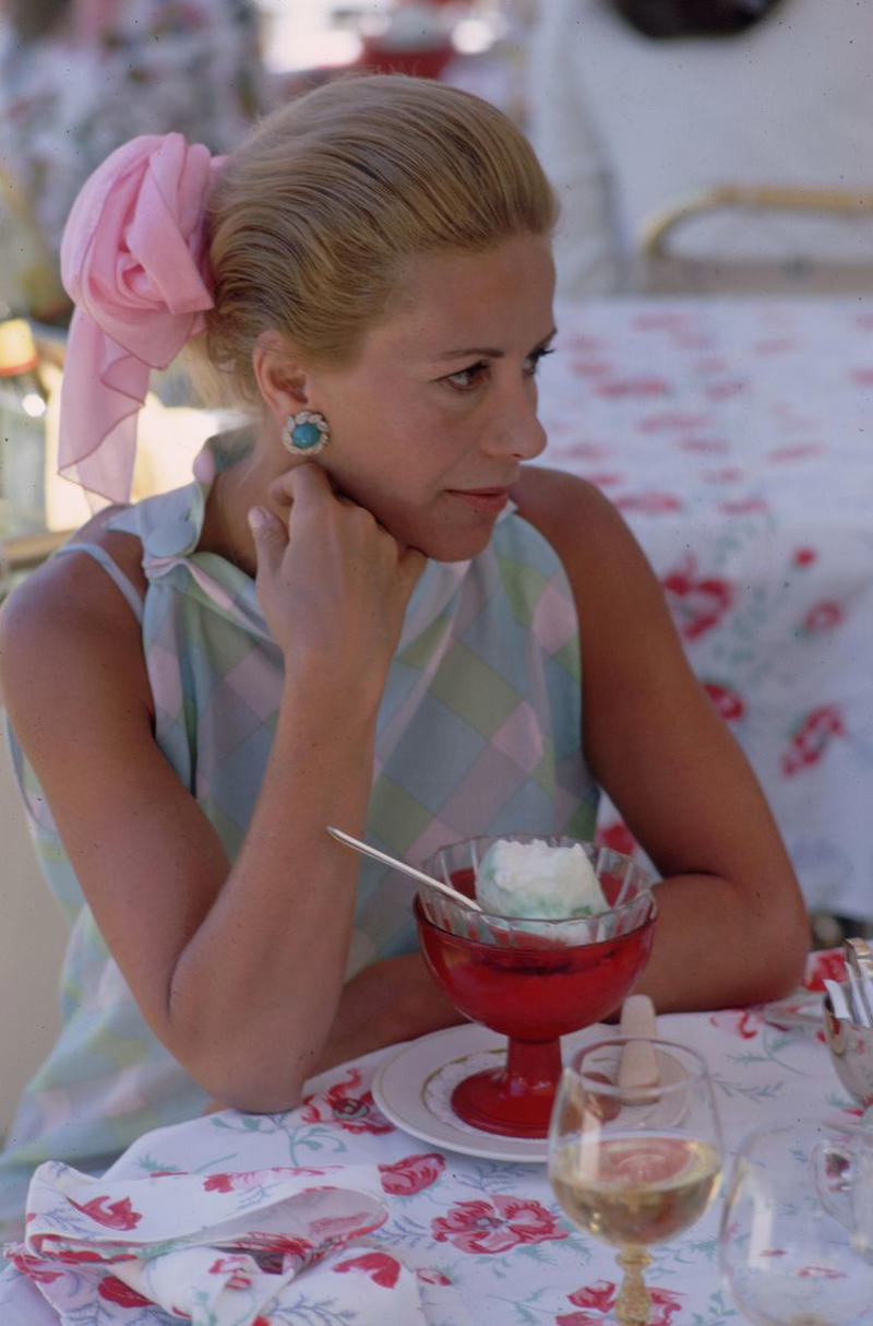 1940: A Glamorous Duo, 1946: A Beach Stroll, 1946: Under the Palm Trees, 1946: A Winter Getaway, 1948: A Fishing Trip, 1953: Street View, 1954: A Day at the Beach, 1955: A Slim Aarons Snapshot, 1955: Sketching by the Beach, 1955: Walking the Dog, 1955: Pretty in Pink, 1955: A Polo Ball, 1955: Worth Avenue, 1955: Evening Elegance, 1955: Luxury Living, 1955: Sipping Champagne, 1956: La Coquille Club, 1958: Glamorous in Chiffon, 1959: Sitting by the Pool, 1959: A Walk on the Wild Side, 1961: The Colony Hotel, 1961: A Pool Party, 1961: A Fashionable Affair, 1964: A Vibrant Duo, 1964: Lilly Pulitzer Designs, 1968: Athina Livanos Onassis, 1968: Outside the Flagler Museum, 1970: A Motorcycle Ride, 1970: A Painted Portrait in Palm Beach, 1970: Pretty Patterns, 1982: Picture-Perfect Palm Beach Home