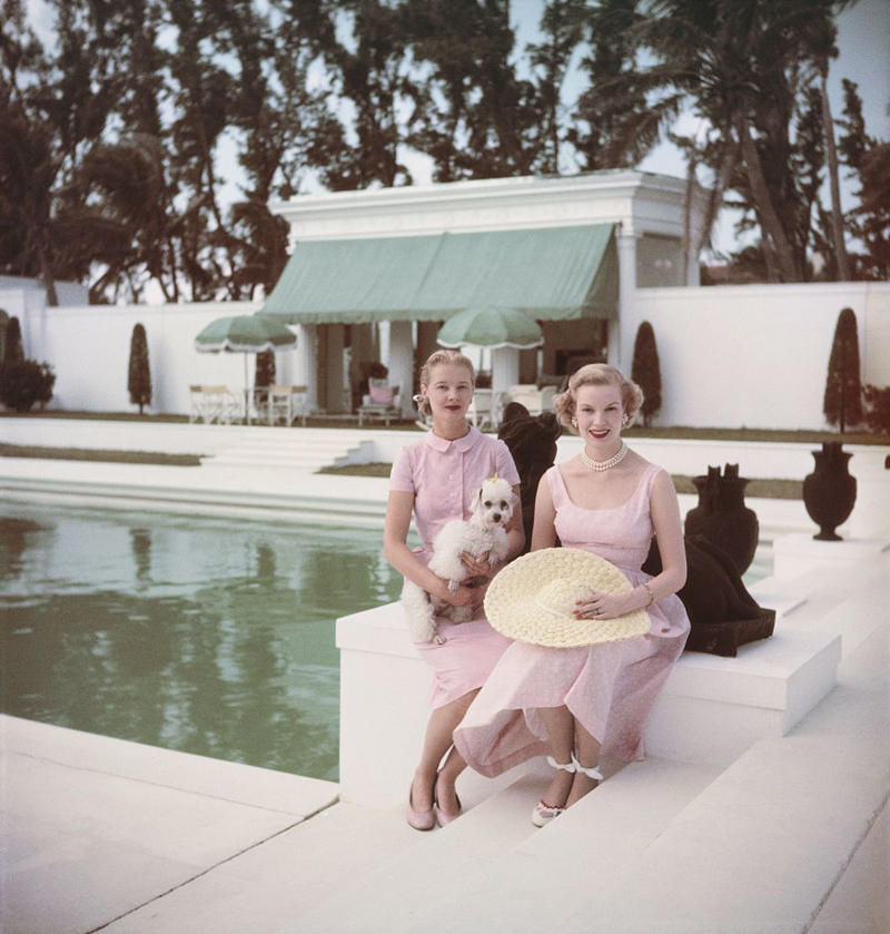 1940: A Glamorous Duo, 1946: A Beach Stroll, 1946: Under the Palm Trees, 1946: A Winter Getaway, 1948: A Fishing Trip, 1953: Street View, 1954: A Day at the Beach, 1955: A Slim Aarons Snapshot, 1955: Sketching by the Beach, 1955: Walking the Dog, 1955: Pretty in Pink, 1955: A Polo Ball, 1955: Worth Avenue, 1955: Evening Elegance, 1955: Luxury Living, 1955: Sipping Champagne, 1956: La Coquille Club, 1958: Glamorous in Chiffon, 1959: Sitting by the Pool, 1959: A Walk on the Wild Side, 1961: The Colony Hotel, 1961: A Pool Party, 1961: A Fashionable Affair, 1964: A Vibrant Duo, 1964: Lilly Pulitzer Designs, 1968: Athina Livanos Onassis, 1968: Outside the Flagler Museum, 1970: A Motorcycle Ride, 1970: A Painted Portrait in Palm Beach, 1970: Pretty Patterns, 1982: Picture-Perfect Palm Beach Home