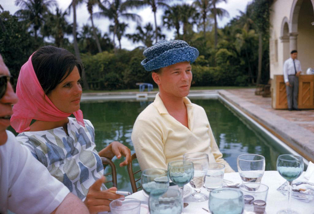 1940: A Glamorous Duo, 1946: A Beach Stroll, 1946: Under the Palm Trees, 1946: A Winter Getaway, 1948: A Fishing Trip, 1953: Street View, 1954: A Day at the Beach, 1955: A Slim Aarons Snapshot, 1955: Sketching by the Beach, 1955: Walking the Dog, 1955: Pretty in Pink, 1955: A Polo Ball, 1955: Worth Avenue, 1955: Evening Elegance, 1955: Luxury Living, 1955: Sipping Champagne, 1956: La Coquille Club, 1958: Glamorous in Chiffon, 1959: Sitting by the Pool, 1959: A Walk on the Wild Side, 1961: The Colony Hotel, 1961: A Pool Party, 1961: A Fashionable Affair, 1964: A Vibrant Duo, 1964: Lilly Pulitzer Designs, 1968: Athina Livanos Onassis, 1968: Outside the Flagler Museum, 1970: A Motorcycle Ride, 1970: A Painted Portrait in Palm Beach, 1970: Pretty Patterns, 1982: Picture-Perfect Palm Beach Home