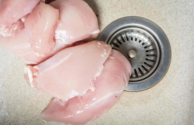 9. You should wash your chicken 29. Broccoli contains more protein than steak, 28. Keeping the pit in an avocado will prevent it from browning, 27. If a soup is too salty, you should add a peeled raw potato, 26. Beaver butt secretions are used in all artificial vanilla products, 25. The longer you marinate meat, the better, 24. American cheese was invented in the USA, 23. You shouldn't cook tomatoes in a cast-iron pan, 22. You should always sift your flour for baking, 21. Turkey makes you sleepy, 20. Drinking milk prevents bone fractures, 19. You shouldn’t cook with extra-virgin olive oil, 18. You shouldn’t crowd mushrooms in a pan, 17. You shouldn't wash mushrooms, 16. Alcohol burns off during cooking, 15. Raw vegetables are healthier than cooked vegetables, 14. KFC uses genetically engineered chickens, 13. The seeds are the spiciest part of a chilli pepper, 12. All wine is vegan, 11. You should wait half an hour after eating before swimming, 10. If you swallow gum, it'll stay in your stomach for seven years, 9. You should wash your chicken, 8. Searing meat keeps the juices in, 7. MSG is bad for you, 6. Eating carrots improves your eyesight, 5. Sharp knives are more likely to cause an injury, 4. You should drink eight glasses of water a day, 3. Chocolate gives you spots, 2. Adding oil to pasta water prevents it from sticking