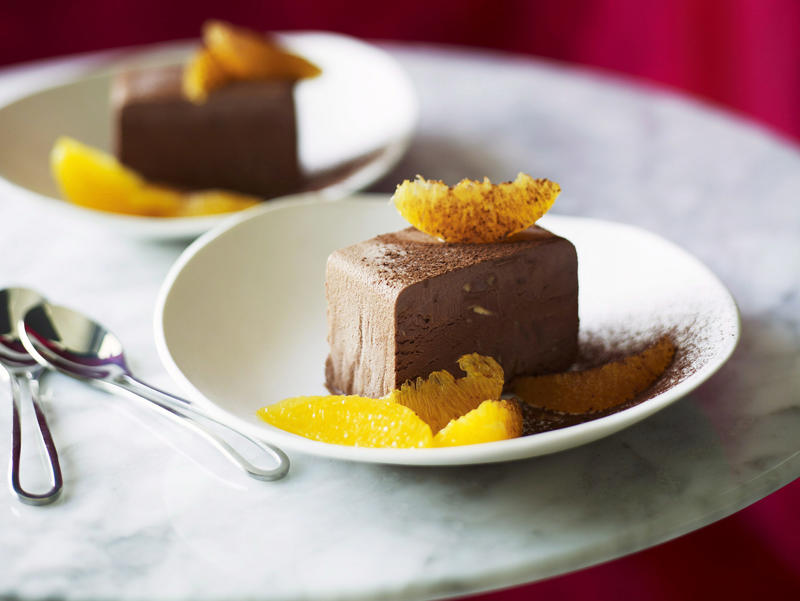 Popular orange varieties for these recipes, Orange recipes to try, Julie Goodwin’s orange almond cake , Flourless orange & white chocolate cake , Double-crumbed pork cotoletta with radicchio & orange salad , Whole orange slice , Orange and blueberry syrup cake , Sugar-free rosemary, labne and orange tart , Hummingbird slice with orange icing , Dark chocolate and orange Christmas slice , Cherry coconut and orange cake , Sweet pea, cinnamon and orange cake , Confit duck & candied orange salad , Chocolate parfait with orange salad , Beetroot and orange salad , Pan-fried fish with radicchio and orange salad , Blood-orange glazed ham , Blood orange hazelnut cake , How to make a chocolate orange ‘tiger’ bundt cake , Green salad with red currants & orange dressing , Orange, poppy seed & olive oil mug cake , Maple, mustard and orange glazed ham , How to choose the best oranges for these recipes, How to remove wax from oranges, Should oranges be stored in or out of the fridge?, How to segment an orange