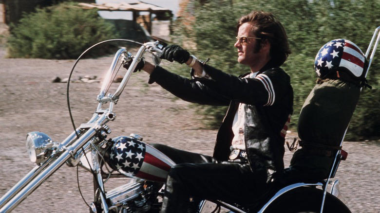 Peter Fonda on Captain America Chopper in Easy Rider, Zed's Harley-Davidson FXR Super Glide Chopper — Pulp Fiction, Chino's Harley-Davidson Hydra-Glide — The Wild One, Johnny Blaze's Harley-Davidson Panhead — Ghost Rider, T-800's Harley-Davidson Fat Boy — Terminator 2, Wyatt's Harley-Davidson Captain America Chopper — Easy Rider, Rocky Balboa's Harley-Davidson FLH 80 — Rocky III, Jax Teller's Harley-Davidson FXD Dyna Super Glide — Sons of Anarchy, Hobbs' Harley-Davidson Softail — Hobbs and Shaw, Captain America's Harley-Davidson WLA Liberator — Captain America: The First Avenger, Fonz's Harley-Davidson Knucklehead — Happy Days