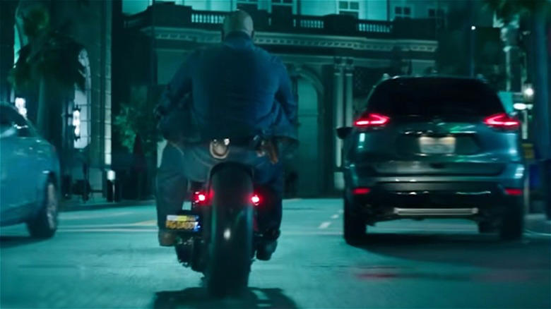 Dwayne Johnson on Harley-Davidson Softail in Hobbs and Shaw, Zed's Harley-Davidson FXR Super Glide Chopper — Pulp Fiction, Chino's Harley-Davidson Hydra-Glide — The Wild One, Johnny Blaze's Harley-Davidson Panhead — Ghost Rider, T-800's Harley-Davidson Fat Boy — Terminator 2, Wyatt's Harley-Davidson Captain America Chopper — Easy Rider, Rocky Balboa's Harley-Davidson FLH 80 — Rocky III, Jax Teller's Harley-Davidson FXD Dyna Super Glide — Sons of Anarchy, Hobbs' Harley-Davidson Softail — Hobbs and Shaw, Captain America's Harley-Davidson WLA Liberator — Captain America: The First Avenger, Fonz's Harley-Davidson Knucklehead — Happy Days