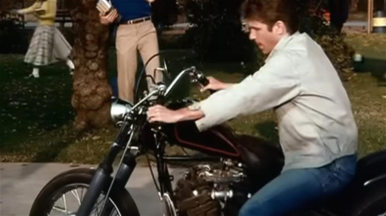 Henry Winkler on Harley-Davidson Knucklehead in Happy Days, Zed's Harley-Davidson FXR Super Glide Chopper — Pulp Fiction, Chino's Harley-Davidson Hydra-Glide — The Wild One, Johnny Blaze's Harley-Davidson Panhead — Ghost Rider, T-800's Harley-Davidson Fat Boy — Terminator 2, Wyatt's Harley-Davidson Captain America Chopper — Easy Rider, Rocky Balboa's Harley-Davidson FLH 80 — Rocky III, Jax Teller's Harley-Davidson FXD Dyna Super Glide — Sons of Anarchy, Hobbs' Harley-Davidson Softail — Hobbs and Shaw, Captain America's Harley-Davidson WLA Liberator — Captain America: The First Avenger, Fonz's Harley-Davidson Knucklehead — Happy Days