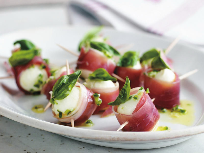 Smarter finger food ideas, How much finger food to serve, Be prepared for impromptu entertaining, Pre-dinner nibbles, What is a fancy finger food called?, Finger food ideas for your next party, Easy spanakopita pies , Chicken lettuce cups with green tahini dressing , Air fryer sausage rolls , Little chicken and leek pies , Air fryer popcorn-coated chicken with honey BBQ sauce , Espresso martini cocktail , Watermelon mocktail with strawberry & mint , Tomato & goat’s cheese pissaladière , Baked brie fondue on the barbecue , Air fryer zucchini balls with lemon yoghurt , How to make a classic mojito , Fried harissa-stuffed green olives , Salt and pepper squid , Bruschetta , Five-ingredient tomato fritters , Beef, haloumi and spinach borek , Roasted garlicky pumpkin and sage pies , Rosé sangria , Air fryer pickle chips with ranch dipping sauce , Spiced paneer and eggplant pakora , Crispy fried pork dumplings , Air fryer chicken nuggets , Arancini with tomato and balsamic sauce , Chocolate and smoked almond ice-cream sandwiches , Strawberry and elderflower mocktail , Spelt blini with hot smoked salmon and crème fraîche , Bread crisps with confit tomatoes , Baked brie with pine nut dukkah , Caramelised leek and brie tartlets , Bacon and cheese arancini , Mulled “wine” mocktail , Passionfruit and pineapple spritzer , Chicken and mango rice paper rolls , Poached eggs and smoked salmon on blini , Feta and spinach stuffed potato balls , Marinated baby bocconcini with prosciutto