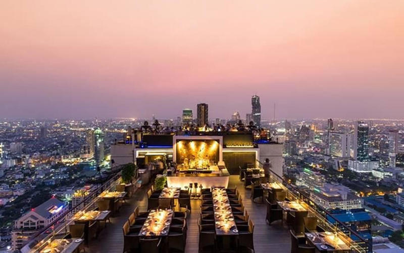 3. Vertigo and Moon Bar – Bangkok, Thailand 1. Ithaa Undersea Restaurant – Rangali Island, Maldives, 2. Le Jules Verne – Paris, France, 3. Vertigo and Moon Bar – Bangkok, Thailand, 4. Sierra Mar – Big Sur, California, 5. 139 Pavilion – Cairo, Egypt, 6. Ambrosia – Santorini, Greece, 7. Giraffe Manor – Nairobi, Kenya, 8. La MarléNaz – Bagnes, Switzerland, 9. Altitude – Sydney, Australia, 10. Mirablau – Barcelona, Spain, 11. Tuju – São Paulo, Brazil, 12. Dasheene – St. Lucia, 13. Cristal Room by Anne-Sophie Pic – Hong Kong, China, 14. Ariana's Persian Kitchen – Dubai, UAE