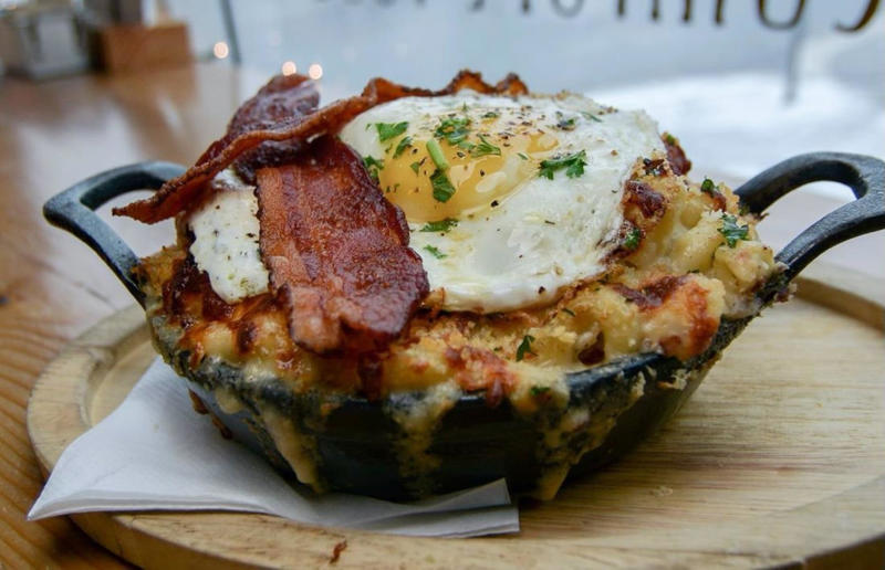 Vermont: Breakfast Mac, Our House Bistro, Winooski Bacon with EVERYTHING, Alabama: BALT, Urban Cookhouse, various locations, Alaska: Fat Elvis milkshake, Snow City Cafe, Anchorage, Arizona: stuffed Medjool dates, J.T. Prime Kitchen & Cocktails, Yuma, Arkansas: Eggniter, Golden Kolache Bakery, Fayetteville, California: B’B’B’ Bacon, Slater's 50/50, various locations, Colorado: signature bacon flight, Bacon Social House, various locations, Connecticut: smoked mac & cheese, Pig Rig BBQ, Wallingford, Delaware: bacon cheese fries, m2o Burgers & Salads, Newark, District of Columbia: glazed bacon lollis, Founding Farmers, various locations, Florida: candied bacon maple ice cream, Ulele, Tampa, Georgia: BBQ bacon, Burger 21, Kennesaw and Buford, Hawaii: Fat Boy, Hank's Haute Dogs, Honolulu, Idaho: bacon, egg, and cheese breakfast tacos, Tin Roof Tacos, various locations, Illinois: cheeseburger, Au Cheval, Chicago, Indiana: BLT croissant, Rize, various locations, Iowa: pancake sandwich, The Breakfast Club, various locations, Kansas: bleu cheese and bacon burger, The Anchor, Wichita, Kentucky: maple bacon donut, Nord's Bakery, Louisville, Louisiana: Buckboard Bacon Melt, Cochon Butcher, New Orleans, Maine: bacon Cheddar, The Holy Donut, Portland, Maryland: Baltimore Burger, Abbey Burger Bistro, Baltimore and Havre de Grace, Massachusetts: 'Irish' nachos, Harry's Bar & Grill, Boston, Michigan: BLT, Tony’s I-75, Birch Run, Minnesota: Millionaire bacon burger, Granite City Food & Brewery, various locations, Mississippi: Redneck Benny, Big Bad Breakfast, Oxford, Missouri: The Combo, Songbird, St. Louis, Montana: The 'Mazatlan' Mexican Dog, The Burger Dive, Billings, Nebraska: Greatest Burger Ever, Honest Abe’s Burgers & Freedom, Lincoln, Nebraska, Nevada: 24K Burger, Slater's 50/50, Las Vegas, New Hampshire: Bacon Bene, The Bacon Barn, Londonderry, New Jersey: bacon brisket sandwich, Bake'n Bacon, Cape May, New Mexico: BB&C, Urban Hotdog Company, Albuquerque, New York: Clothesline Bacon, David Burke Tavern, New York City, North Carolina: BLT, Merritt's Grill, Chapel Hill, North Dakota: The Elvis, Bearscat Bakehouse, Bismarck and Minot, Ohio: Biscuit BLT, Dough Mama, Columbus, Oklahoma: Brussels sprouts, Packard’s, Oklahoma City, Oregon: praline bacon, Screen Door, Portland, Pennsylvania: bacon flight, Bacon, Bourbon & Beer, Washington, Rhode Island: BLT, The Malted Barley, Providence, South Carolina: candied bacon brownie, Nose Dive, Greenville, South Dakota: bacon wrapped filet mignon, Alpine Inn, Hill City, Tennessee: Southern Sampler Breakfast, The Loveless Cafe, Nashville, Texas: chicken fried bacon, Sodolak's Original Country Inn, Snook, Utah: roasted bacon wrapped dates, Midway Mercantile Restaurant, Midway, Vermont: Breakfast Mac, Our House Bistro, Winooski, Virginia: Mother Clucker, Capitol Waffle Shop, various locations, Washington: Meatza, Windy City Pie, Seattle, West Virginia: hot chicken sandwich with bacon, Wood Iron Eatery, Fayetteville, Wisconsin: tequila jam burger, 11:11 Burgers & Beignets, Fond Du Lac, Wisconsin