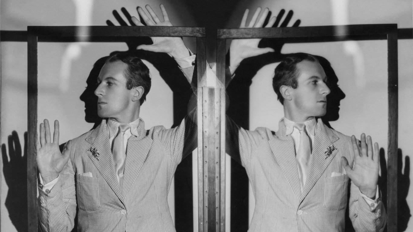 45. British photographer and costume designer Cecil Beaton 1. Three models with hats by Hélène Sorbier, 2. People celebrating New Year’s Eve at El Morocco in New York City, 3. Ernest Hemingway and Marlene Dietrich, 4. Three women modeling dresses by Marcelle Landowska, 5. Lady smiling for a portrait, 6. Family of four listening to the radio, 7. German film director Fritz Lang, 9. Stepping out for a spring fashion parade in Brisbane, Australia, 10. Jean Harlow with Marcel Waves, 11. Conductors Serge Koussevitsky (left) and Sir Thomas Beecham, 12. Models with an audience in Paris, 13. American cartoonist and fashion designer Gladys Parker, 14. Three women with hats in Paris, 15. Golfer Bobby Jones (right) with the Walker Cup in Sandwich, England, 16. Models posing for a fashion shoot, 17. Modeling dresses by Hélène Sorbier in Paris, 18. German industrialist and arms manufacturer Gustav Krupp von Bohlen und Halbach (second from right) with his extended family, 19. A model in Paris, 20. Louisiana governor and senator Huey Long at a radio broadcast, 21. Brazilian politician Getúlio Vargas, 22. A model at the House of Paquin in Paris, 23. Two models in suits in Paris, 24. Austrian doctor and psychotherapist Alfred Adler, 25. Boxer Jack Dempsey, 26. British politician James Thomas (center) and friends, 27. Posing outside a cat show at the Salle Wagram, Paris, 28. Miss France, 29. Attorney Clarence Darrow (right), 30. Model De Decker with hat, 31. Actresses Laurette Taylor (left) and Ethel Barrymore, 32. Model De Decker with another hat, 33. Two models with hats in Paris, 34. Model Eliane Richer with hat, 35. Austrian-born actor and director Erich Von Stroheim, 36. Model Hélène Sorbier with hat, 37. Douglas Fairbanks Jr. (left), Charlie Chaplin, and Mary Pickford, 38. Fashion models, 39. Model in long dress with hat, 40. Models in a Red Bug Electric Roadster car at the Edison Electrical Exposition in New York, 41. Model with a hat, 42. Gary Cooper (right) and a location caterer on the set of “The Spoilers”, 43. A reception for golfer Bobby Jones after his British Open victory, 44. Model in a dress, 45. British photographer and costume designer Cecil Beaton, 46. Business mogul and multimillionaire John D. Rockefeller, 47. Five college girls jumping in winter clothes, 48. Model Hélène Sorbier with hat, 49. Model in a summer dress with hat, 50. Businessman and philanthropist Simon Guggenheim, 51. Diplomats from Czechoslovakia, Romania, and Yugoslavia at a Little Entente conference in Belgrade, 52. Model with a hat in Paris, 53. Woman standing outside