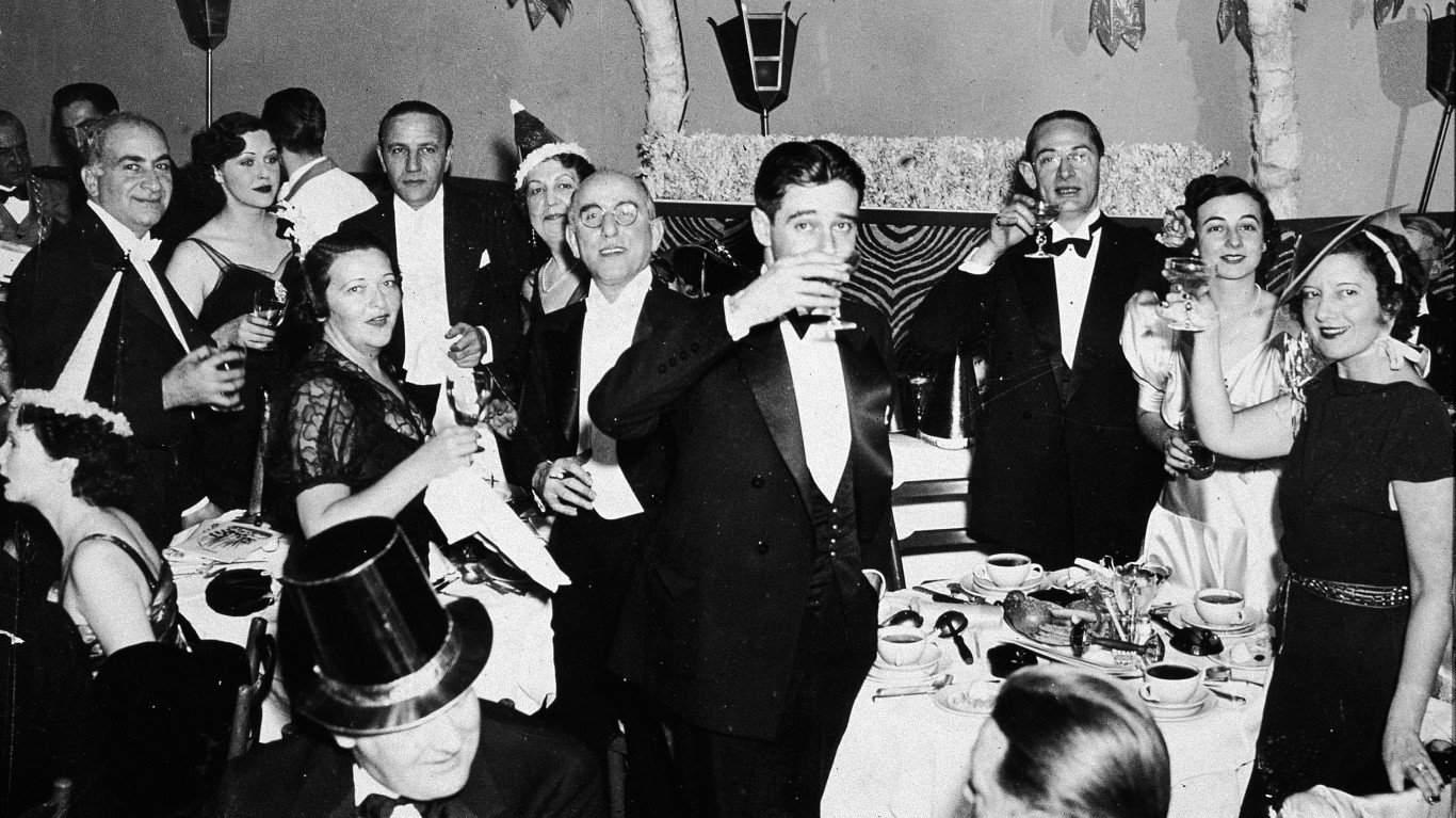 2. People celebrating New Year’s Eve at El Morocco in New York City 1. Three models with hats by Hélène Sorbier, 2. People celebrating New Year’s Eve at El Morocco in New York City, 3. Ernest Hemingway and Marlene Dietrich, 4. Three women modeling dresses by Marcelle Landowska, 5. Lady smiling for a portrait, 6. Family of four listening to the radio, 7. German film director Fritz Lang, 9. Stepping out for a spring fashion parade in Brisbane, Australia, 10. Jean Harlow with Marcel Waves, 11. Conductors Serge Koussevitsky (left) and Sir Thomas Beecham, 12. Models with an audience in Paris, 13. American cartoonist and fashion designer Gladys Parker, 14. Three women with hats in Paris, 15. Golfer Bobby Jones (right) with the Walker Cup in Sandwich, England, 16. Models posing for a fashion shoot, 17. Modeling dresses by Hélène Sorbier in Paris, 18. German industrialist and arms manufacturer Gustav Krupp von Bohlen und Halbach (second from right) with his extended family, 19. A model in Paris, 20. Louisiana governor and senator Huey Long at a radio broadcast, 21. Brazilian politician Getúlio Vargas, 22. A model at the House of Paquin in Paris, 23. Two models in suits in Paris, 24. Austrian doctor and psychotherapist Alfred Adler, 25. Boxer Jack Dempsey, 26. British politician James Thomas (center) and friends, 27. Posing outside a cat show at the Salle Wagram, Paris, 28. Miss France, 29. Attorney Clarence Darrow (right), 30. Model De Decker with hat, 31. Actresses Laurette Taylor (left) and Ethel Barrymore, 32. Model De Decker with another hat, 33. Two models with hats in Paris, 34. Model Eliane Richer with hat, 35. Austrian-born actor and director Erich Von Stroheim, 36. Model Hélène Sorbier with hat, 37. Douglas Fairbanks Jr. (left), Charlie Chaplin, and Mary Pickford, 38. Fashion models, 39. Model in long dress with hat, 40. Models in a Red Bug Electric Roadster car at the Edison Electrical Exposition in New York, 41. Model with a hat, 42. Gary Cooper (right) and a location caterer on the set of “The Spoilers”, 43. A reception for golfer Bobby Jones after his British Open victory, 44. Model in a dress, 45. British photographer and costume designer Cecil Beaton, 46. Business mogul and multimillionaire John D. Rockefeller, 47. Five college girls jumping in winter clothes, 48. Model Hélène Sorbier with hat, 49. Model in a summer dress with hat, 50. Businessman and philanthropist Simon Guggenheim, 51. Diplomats from Czechoslovakia, Romania, and Yugoslavia at a Little Entente conference in Belgrade, 52. Model with a hat in Paris, 53. Woman standing outside