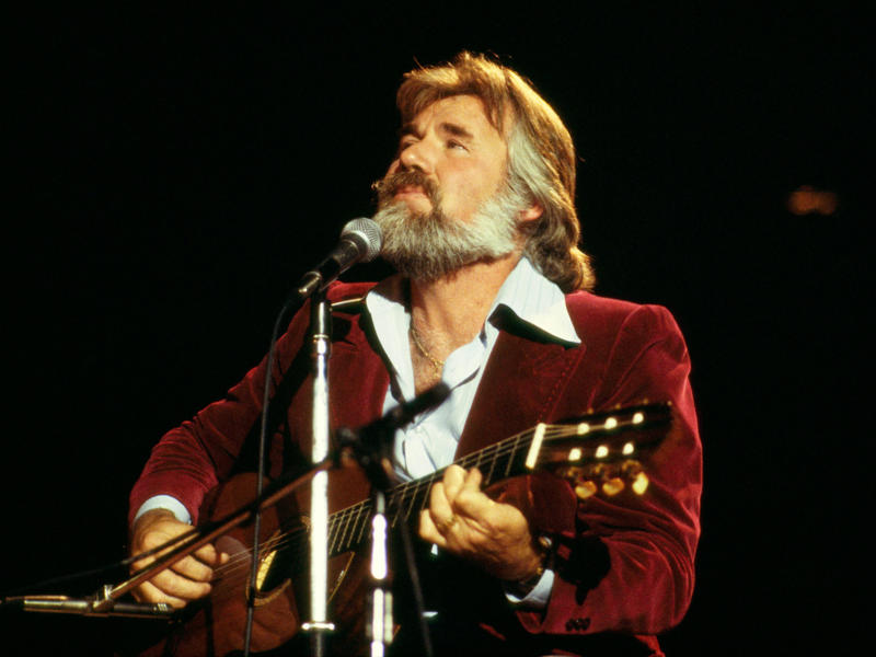 7. Kenny Rogers — 47.5 million units 25. Luke Bryan — 19 million units, 24. Hank Williams Jr. — 19.5 million units, 23. Brooks & Dunn — 21.5 million units, 22. Carrie Underwood — 22.5 million units, 21. Jimmy Buffett — 23 million units, 18. Vince Gill — 24 million units, 15. Linda Ronstadt — 30 million units, 14. Willie Nelson — 31.5 million units, 13. The Chicks — 33 million units, 12. John Denver — 33.5 million units, 11. Kenny Chesney — 35 million units, 8. Alan Jackson — 44.5 million units, 7. Kenny Rogers — 47.5 million units, 6. Shania Twain — 48 million units, 5. Alabama — 49 million units, 4. Taylor Swift — 57 million units, 3. George Strait — 69.5 million units, 2. Elvis Presley — 146.5 million units, 1. Garth Brooks — 162 million units