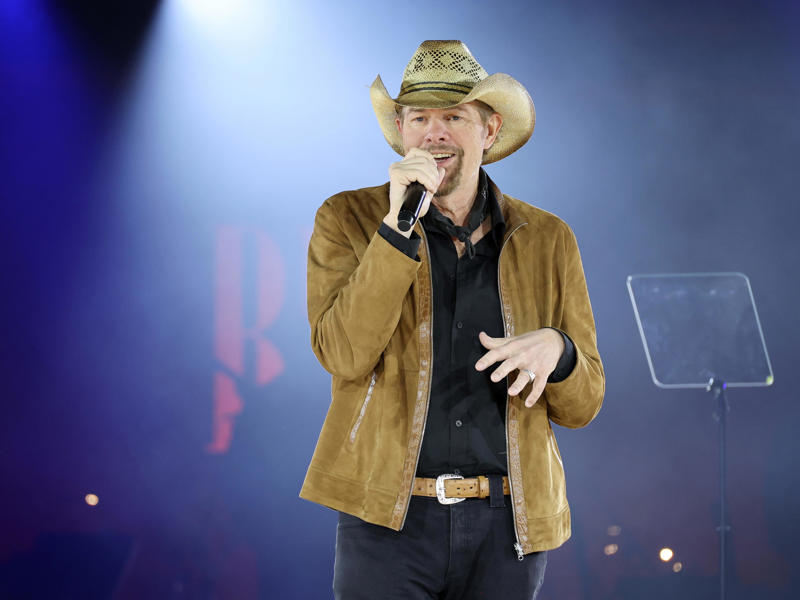 17. Toby Keith — 25.5 million units 25. Luke Bryan — 19 million units, 24. Hank Williams Jr. — 19.5 million units, 23. Brooks & Dunn — 21.5 million units, 22. Carrie Underwood — 22.5 million units, 21. Jimmy Buffett — 23 million units, 18. Vince Gill — 24 million units, 15. Linda Ronstadt — 30 million units, 14. Willie Nelson — 31.5 million units, 13. The Chicks — 33 million units, 12. John Denver — 33.5 million units, 11. Kenny Chesney — 35 million units, 8. Alan Jackson — 44.5 million units, 7. Kenny Rogers — 47.5 million units, 6. Shania Twain — 48 million units, 5. Alabama — 49 million units, 4. Taylor Swift — 57 million units, 3. George Strait — 69.5 million units, 2. Elvis Presley — 146.5 million units, 1. Garth Brooks — 162 million units