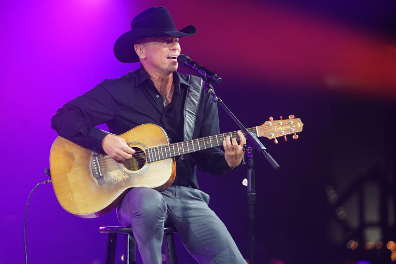 11. Kenny Chesney — 35 million units 25. Luke Bryan — 19 million units, 24. Hank Williams Jr. — 19.5 million units, 23. Brooks & Dunn — 21.5 million units, 22. Carrie Underwood — 22.5 million units, 21. Jimmy Buffett — 23 million units, 18. Vince Gill — 24 million units, 15. Linda Ronstadt — 30 million units, 14. Willie Nelson — 31.5 million units, 13. The Chicks — 33 million units, 12. John Denver — 33.5 million units, 11. Kenny Chesney — 35 million units, 8. Alan Jackson — 44.5 million units, 7. Kenny Rogers — 47.5 million units, 6. Shania Twain — 48 million units, 5. Alabama — 49 million units, 4. Taylor Swift — 57 million units, 3. George Strait — 69.5 million units, 2. Elvis Presley — 146.5 million units, 1. Garth Brooks — 162 million units