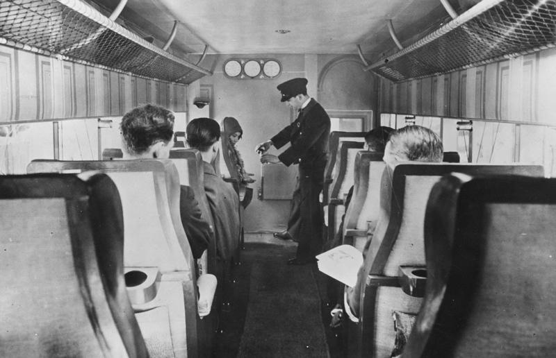1920s: a flight attendant serves drinks on a French Airliner service A flight back in time, 1920s: the beginnings of air travel, 1920s: a passenger compartment from the 1920s, 1920s: inside a Transcontinental Air Transport plane, 1920s: bed compartments of a German Junker aircraft, 1920s: a flight attendant serves drinks on a French Airliner service, 1920s: an early German Deutsche Luft Hansa plane, 1920s: the Dornier Do X dining salon, 1920s: the first ever in-flight movie, 1920s: enjoying breakfast at 3,000 feet (914m), 1920s: passengers get weighed before their flight, 1930s: passengers climb aboard a plane at Croydon Airport, England, 1930s: crew members check bags before a flight to LA, 1930s: the check-in desk at newly opened Gatwick Airport, 1930s: an early plane with wicker seats, 1930s: the comfortable seats of a Handley Page HP42, 1930s: a plush Imperial Airways cabin, 1930s: passengers aboard the Douglas DC-1, 1930s: a flight attendant serves tea in bed, 1930s: ladies traveling on an Eastern Air Transport plane, 1930s: chefs load up a plane with homemade treats, 1930s: women in their finest attire wait to board a plane, 1930s: passengers listen to a broadcast aboard a flight, Early 1940s: passengers on board the Junkers G.38 plane, 1940s: day cabins inside an Imperial Airways flying boat, 1940s: interior of a McDonnell Douglas DC-6, 1940s: inside a Sikorsky S-40 flying boat, Late 1930s: the early days of Pan Am, 1940s: Pan American Airlines' Boeing 314 Clipper sets off, 1940s: inside the Boeing 314 flying boat, 1940s: it wasn't cheap to fly aboard the Boeing 314, 1940s: a couple enjoys dinner aboard the Boeing 314, 1940s: the early days of Heathrow Airport, 1940s: Boeing 307 Stratoliner's cocktail lounge, 1940s: the overnight intercontinental service onboard Boeing Stratocruiser, 1940s: the communal lounge aboard a Boeing aeroplane, 1950s: guests relax in an onboard lounge compartment, 1950s: the Sky-Cot aboard a British Overseas Airways Corporation flight, 1950s: a movie projector on a United Airlines flight