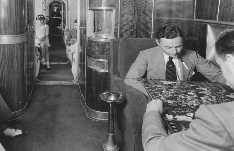 1940s: it wasn't cheap to fly aboard the Boeing 314 A flight back in time, 1920s: the beginnings of air travel, 1920s: a passenger compartment from the 1920s, 1920s: inside a Transcontinental Air Transport plane, 1920s: bed compartments of a German Junker aircraft, 1920s: a flight attendant serves drinks on a French Airliner service, 1920s: an early German Deutsche Luft Hansa plane, 1920s: the Dornier Do X dining salon, 1920s: the first ever in-flight movie, 1920s: enjoying breakfast at 3,000 feet (914m), 1920s: passengers get weighed before their flight, 1930s: passengers climb aboard a plane at Croydon Airport, England, 1930s: crew members check bags before a flight to LA, 1930s: the check-in desk at newly opened Gatwick Airport, 1930s: an early plane with wicker seats, 1930s: the comfortable seats of a Handley Page HP42, 1930s: a plush Imperial Airways cabin, 1930s: passengers aboard the Douglas DC-1, 1930s: a flight attendant serves tea in bed, 1930s: ladies traveling on an Eastern Air Transport plane, 1930s: chefs load up a plane with homemade treats, 1930s: women in their finest attire wait to board a plane, 1930s: passengers listen to a broadcast aboard a flight, Early 1940s: passengers on board the Junkers G.38 plane, 1940s: day cabins inside an Imperial Airways flying boat, 1940s: interior of a McDonnell Douglas DC-6, 1940s: inside a Sikorsky S-40 flying boat, Late 1930s: the early days of Pan Am, 1940s: Pan American Airlines' Boeing 314 Clipper sets off, 1940s: inside the Boeing 314 flying boat, 1940s: it wasn't cheap to fly aboard the Boeing 314, 1940s: a couple enjoys dinner aboard the Boeing 314, 1940s: the early days of Heathrow Airport, 1940s: Boeing 307 Stratoliner's cocktail lounge, 1940s: the overnight intercontinental service onboard Boeing Stratocruiser, 1940s: the communal lounge aboard a Boeing aeroplane, 1950s: guests relax in an onboard lounge compartment, 1950s: the Sky-Cot aboard a British Overseas Airways Corporation flight, 1950s: a movie projector on a United Airlines flight