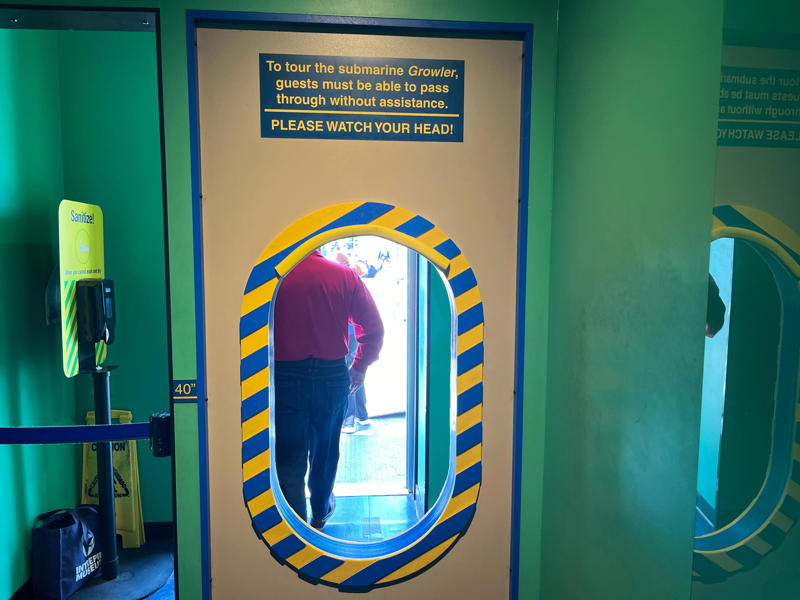 There was also a sample doorway to make sure guests could walk through the submarine. In the navigation compartment, crew members plotted courses and tracked Growler's position., The missile checkout and guidance center was once a top-secret area., Officers had access to their own shower., Officers used the wardroom to eat, socialize, and hold meetings., Yeomen handled clerical and administrative work aboard the USS Growler's tiny office., Here, the commanding officer would give orders to the crew., The sonar room also aided Growler's navigation., Crew members communicated with other ships in the radio room., Meals were prepared in the galley., In the scullery, Growler crew members washed dishes and compacted trash., The crew's mess was the only common space on the USS Growler., Growler's largest sleeping area contained 46 bunks., The crew's washroom featured two showers., Growler's three diesel engines were located in the engine room.
