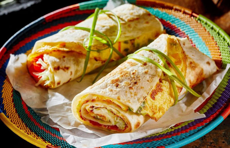 31. Rolex, Uganda 36. Bitterballen, Netherlands, 35. Pierogi, Poland, 34. Choripán, Argentina, 33. Slider, USA, 32. Elote, Mexico, 31. Rolex, Uganda, 30. Pad Thai, Thailand, 29. Souvlaki, Greece, 28. Bhelpuri, India, 27. Bánh mì, Vietnam, 26. Ta’ameya, Egypt, 25. Chǎofàn, China, 24. Shawarma, Turkey, 23. Arepa, Venezuela and Colombia, 22. Vada pav, India, 21. Gyros, Greece, 20. Churros, Spain, 19. Bao buns, China, 18. Fish and chips, UK, 17. Takoyaki, Japan, 16. Currywurst, Germany, 15. Burrito, Mexico or USA, 14. Döner kebab, Germany, 13. Bunny chow, South Africa, 12. Tacos, Mexico, 11. Meat pie, Australia, 10. Bratwurst, Germany, 9. Samosa, India, 8. Poutine, Canada, 7. Cheeseburger, USA, 6. Fried chicken, various locations, 5. Hot dog, various locations, 4. Fried chicken sandwich, USA, 3. Pizza, Italy, 2. Hamburger, various locations