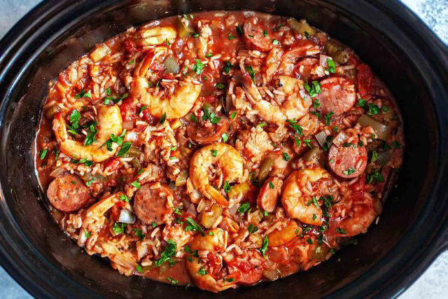 1. Slow Cooker Jambalaya, 2. Mississippi Chicken, 3. Slow Cooker Corned Beef and Cabbage, 4. Slow Cooker Cider Pulled Pork, 5. Slow Cooker Green Bean Casserole, 6. Slow Cooker Spinach Feta Dip, 7. Slow Cooker Stuffing, 8. Easy Slow Cooker Chicken Chili, 9. Slow Cooker Bourbon Short Ribs with Cheesy Grits, 10. Jamaican Beef Stew with Scotch Bonnets, Ginger, and Allspice, 11. Slow Cooker Chicken and Rice Casserole, 12. Slow Cooker Lamb Stew with Pomegranate Molasses, 13. Slow Cooker Meatballs in Tomato Sauce, 14. Slow Cooker Chickpea Curry with Sweet Potatoes and Red Peppers, 15. Slow Cooker Pot Roast, 16. Slow Cooker Banana Bread Pudding, 17. Slow Cooker Beef and Bean Chili, 18. Slow Cooker Mexican Pulled Pork Tacos, 19. Slow Cooker Pumpkin Soup, 20. Slow Cooker Boston Baked Beans, 21. Slow Cooker Chicken Tacos, 22. Slow Cooker Spiced Oatmeal, 23. Slow Cooker Dr Pepper Pulled Pork, 24. Spiced Mulled Wine, 25. Slow Cooker Taco Soup, 26. Slow Cooker Mashed Potatoes