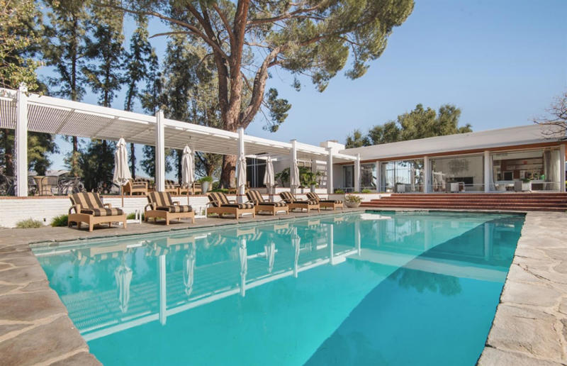 Inside the former homes of entertainment icons, Judy Garland's Bel Air bungalow, Dolores del Rio's bespoke love nest, Frank Sinatra's mid-century modern mansion, Howard Hughes' Spanish Revival mansion, Elizabeth Taylor's Beverly Hills mansion, Marilyn Monroe's would-be forever home, James Dean's Spanish-style hacienda, Lauren Bacall's Manhattan apartment, Cary Grant's romantic Palm Springs hideaway, Yvette Mimieux's Bel Air estate, Audrey Hepburn and Mel Ferrer's Colonial Estate, Marlene Dietrich's Beverly Hills rental, Carmen Miranda's Hollywood home