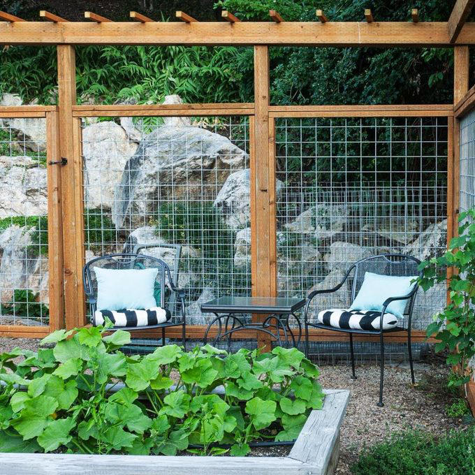 Deer Fence, Wood Fence With Finials, Pallet Wood Fence, Rustic Wood Stick Fence, Wire-Rolled Picket Fence, Cedar Wood Fence, Crossbuck Fence, Salvaged Door Fence, Willow Weave Fence, Repurposed Wood Garden Fence, About the Expert