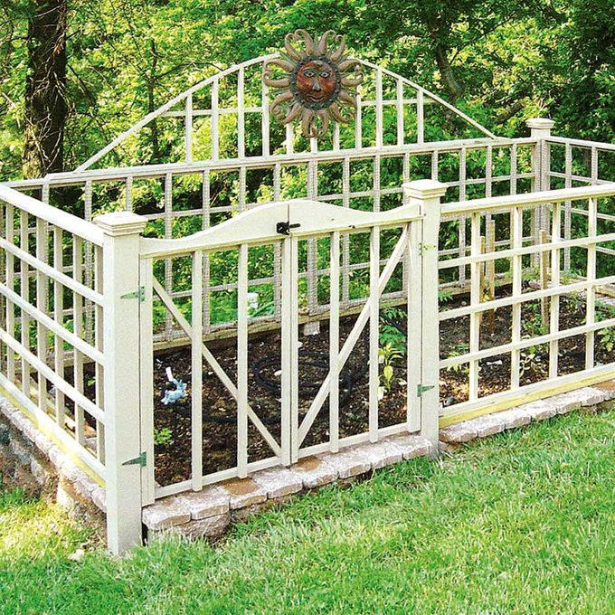 Deer Fence, Wood Fence With Finials, Pallet Wood Fence, Rustic Wood Stick Fence, Wire-Rolled Picket Fence, Cedar Wood Fence, Crossbuck Fence, Salvaged Door Fence, Willow Weave Fence, Repurposed Wood Garden Fence, About the Expert