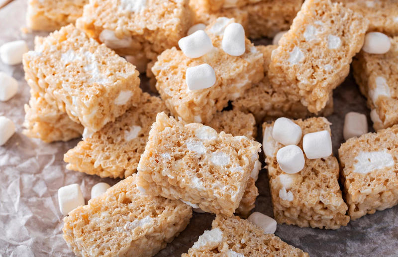 28: Rice Krispie treats, USA 37: Baklava, various locations, 36: Rolex, Uganda, 35: Dadar gulung, Indonesia, 34: Ta'ameya, Egypt, 33: Brownies, USA, 32: Plantain chips, various locations, 31: Koeksister, South Africa, 30: Ma'amoul, Egypt, 29: Takoyaki, Japan, 28: Rice Krispie treats, USA, 27: Poffertjes, Netherlands, 26: Haggis bon bons, Scotland, 25: Pão de queijo, Brazil, 24: Chocolate digestives, UK, 23: Churros, Spain, 22: Kartoffelpuffer, Germany, 21: Stroopwafel, Netherlands, 20: Mooncake, China, 19: Sausage roll, UK, 18: Biltong, South Africa, 17: Aloo tikki, India, 16: Qatayef, Middle East, 15: Lamington, Australia, 14: S'mores, USA, 13: Meat pie, Australia and New Zealand, 12: Lumpia, Indonesia and the Philippines, 11: Nanaimo bar, Canada, 10: Pain au chocolat, France, 9: Mochi, Japan, 8: Pani puri, India, 7: Doughnut, various locations, 6: Poutine, Canada, 5: Currywurst, Germany, 4: Macaron, France, 3: Nachos, Mexico, 2: Samosa, various locations