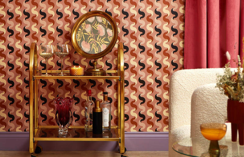 Geometric wallpaper Blasts from the homeware past, Sunken seating areas, Garden swing seats, Geometric wallpaper, Silk and satin sheets, Sputnik Chandeliers, Heated hostess trolleys, Oversized table lamps, Painted door frames, Plaid decor, Mosaic-inspired patterns, Classic cookery aids, Spinning colanders, Plates on walls, Decorating with stripes, Silent servants, Toile Du Jouy prints, Step-up baths, Chrome furnishings, Bed curtains and canopies, Mid-century stonework, Teasmade, Dark wooden cladding, Transom windows, Window seats, Writing desks, Airing cupboards, Clothes drying racks, Stable doors, Hostess trolleys, TV cabinets, Biscuit tins, Radio alarm clocks, Lazy Susans, Magazine racks, Clotheslines, Doorstep shoe scrapers, Paper towel holders, Dish-drying cabinets, Wicker shopping baskets, Terrific teapots, Cast iron trivets, TV tray tables, Bathtub caddies, Laundry chutes, Modular sofas, Serving hatches