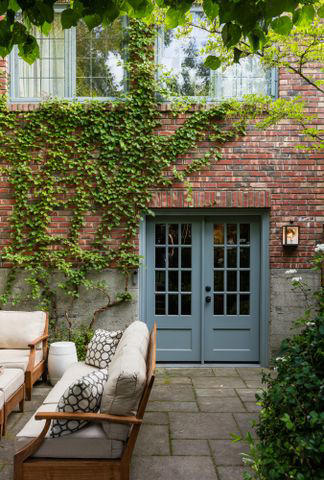 1. Create Privacy with Hedges, 2. Expand a Small Yard with Levels, 3. Layer Shades of Green, 4. Carve out Relaxation Space, 5. Soften the Landings, 6. Link to Indoors, 7. Evoke a Mediterranean Escape, 8. Set the Tone at the Front Door
