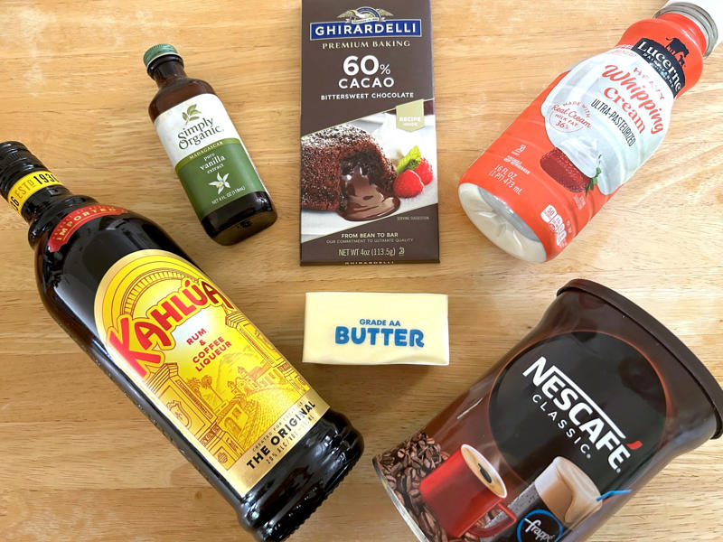 You'll also need some ingredients for the mocha frosting. Garten's chocolate cake features cocoa powder, espresso powder, and "good" vanilla., You'll also need some ingredients for the mocha frosting., I also prepped my dry ingredients ..., … and my chocolate-and-coffee mixture., It was time to start the batter., Then I added the vanilla and eggs., My cake batter was ready!, While my cake was cooling, I began making the frosting., I also prepped the cream., Once the cream was ready, I poured it over the chocolate mixture., Then I stirred in the Kahlúa and vanilla., I covered my frosting and refrigerated it for 30 minutes., It was time to frost my cake., Garten's chocolate cake with mocha icing tasted rich and decadent.