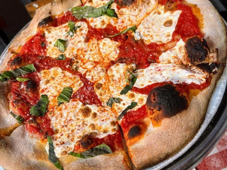 ALABAMA: Gianmarco's Restaurant in Birmingham, ARIZONA: Marcellino Ristorante in Scottsdale, ARKANSAS: Bruno's Little Italy in Little Rock, CONNECTICUT: Mystic Pizza in Mystic, DELAWARE: Mrs. Robino's in Wilmington, FLORIDA: Christini's Ristorante Italiano in Orlando, GEORGIA: La Grotta Ristorante Italiano in Buckhead, Atlanta, HAWAII: Arancino in Honolulu, IDAHO: Luciano's Italian Restaurant in Boise, ILLINOIS: The Village in Chicago, INDIANA: Iaria's Italian Restaurant in Indianapolis, IOWA: Tumea &amp; Sons in Des Moines, KANSAS: Garozzo's in Kansas City, KENTUCKY: Pompilio's in Newport, LOUISIANA: Pascal's Manale in New Orleans, MAINE: Via Vecchia in Portland, MARYLAND: Il Pizzico in Rockville, MASSACHUSETTS: Regina Pizzeria in Boston, MICHIGAN: Buddy's Pizza in Detroit, MINNESOTA: Yarusso Bros in St. Paul, MISSISSIPPI: Giardina's Restaurant in Greenwood, MISSOURI: Jasper's Italian Restaurant in Kansas City, NEBRASKA: Orsi's Italian Bakery &amp; Pizzeria in Omaha, NEVADA: Piero's Italian Cuisine in Las Vegas, NEW HAMPSHIRE: The Rosa in Portsmouth, NEW MEXICO: Trombino's Bistro Italiano in Albuquerque, NEW YORK: Lombardi's in New York City, NORTH CAROLINA: Amedeo's Italian Restaurant in Raleigh, NORTH DAKOTA: Spaghetti Western in Fargo, OHIO: Guarino's in Cleveland, OKLAHOMA: Pete's Place in Krebs, OREGON: Nostrana in Portland, PENNSYLVANIA: The Victor Café in Philadelphia, RHODE ISLAND: Camille's in Providence, SOUTH CAROLINA: Villa Tronco in Columbia, SOUTH DAKOTA: Maribella Ristorante in Sioux Falls, TEXAS: Rosie Cannonball in Houston, UTAH: Valter's Osteria in Salt Lake City, VERMONT: Sarducci's in Montpelier, VIRGINIA: Luigi's Italian Gourmet in Roanoke, WASHINGTON: The Pink Door in Seattle, WEST VIRGINIA: Fazio's Italian Restaurant in Charleston, WISCONSIN: Calderone Club in Milwaukee, WYOMING: Calico Restaurant and Bar in Jackson