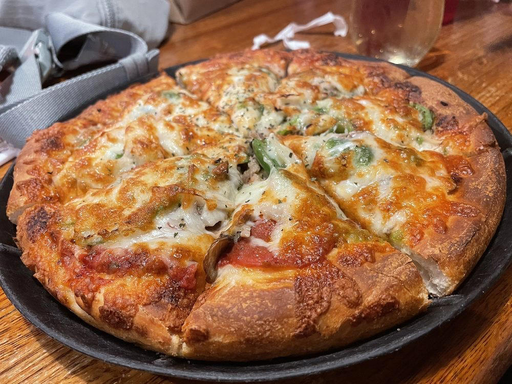 ALABAMA: Gianmarco's Restaurant in Birmingham, ARIZONA: Marcellino Ristorante in Scottsdale, ARKANSAS: Bruno's Little Italy in Little Rock, CONNECTICUT: Mystic Pizza in Mystic, DELAWARE: Mrs. Robino's in Wilmington, FLORIDA: Christini's Ristorante Italiano in Orlando, GEORGIA: La Grotta Ristorante Italiano in Buckhead, Atlanta, HAWAII: Arancino in Honolulu, IDAHO: Luciano's Italian Restaurant in Boise, ILLINOIS: The Village in Chicago, INDIANA: Iaria's Italian Restaurant in Indianapolis, IOWA: Tumea &amp; Sons in Des Moines, KANSAS: Garozzo's in Kansas City, KENTUCKY: Pompilio's in Newport, LOUISIANA: Pascal's Manale in New Orleans, MAINE: Via Vecchia in Portland, MARYLAND: Il Pizzico in Rockville, MASSACHUSETTS: Regina Pizzeria in Boston, MICHIGAN: Buddy's Pizza in Detroit, MINNESOTA: Yarusso Bros in St. Paul, MISSISSIPPI: Giardina's Restaurant in Greenwood, MISSOURI: Jasper's Italian Restaurant in Kansas City, NEBRASKA: Orsi's Italian Bakery &amp; Pizzeria in Omaha, NEVADA: Piero's Italian Cuisine in Las Vegas, NEW HAMPSHIRE: The Rosa in Portsmouth, NEW MEXICO: Trombino's Bistro Italiano in Albuquerque, NEW YORK: Lombardi's in New York City, NORTH CAROLINA: Amedeo's Italian Restaurant in Raleigh, NORTH DAKOTA: Spaghetti Western in Fargo, OHIO: Guarino's in Cleveland, OKLAHOMA: Pete's Place in Krebs, OREGON: Nostrana in Portland, PENNSYLVANIA: The Victor Café in Philadelphia, RHODE ISLAND: Camille's in Providence, SOUTH CAROLINA: Villa Tronco in Columbia, SOUTH DAKOTA: Maribella Ristorante in Sioux Falls, TEXAS: Rosie Cannonball in Houston, UTAH: Valter's Osteria in Salt Lake City, VERMONT: Sarducci's in Montpelier, VIRGINIA: Luigi's Italian Gourmet in Roanoke, WASHINGTON: The Pink Door in Seattle, WEST VIRGINIA: Fazio's Italian Restaurant in Charleston, WISCONSIN: Calderone Club in Milwaukee, WYOMING: Calico Restaurant and Bar in Jackson
