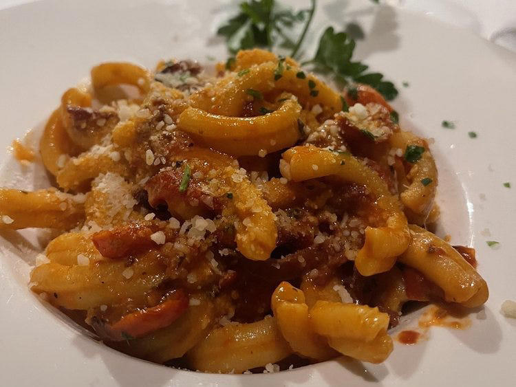 ALABAMA: Gianmarco's Restaurant in Birmingham, ARIZONA: Marcellino Ristorante in Scottsdale, ARKANSAS: Bruno's Little Italy in Little Rock, CONNECTICUT: Mystic Pizza in Mystic, DELAWARE: Mrs. Robino's in Wilmington, FLORIDA: Christini's Ristorante Italiano in Orlando, GEORGIA: La Grotta Ristorante Italiano in Buckhead, Atlanta, HAWAII: Arancino in Honolulu, IDAHO: Luciano's Italian Restaurant in Boise, ILLINOIS: The Village in Chicago, INDIANA: Iaria's Italian Restaurant in Indianapolis, IOWA: Tumea &amp; Sons in Des Moines, KANSAS: Garozzo's in Kansas City, KENTUCKY: Pompilio's in Newport, LOUISIANA: Pascal's Manale in New Orleans, MAINE: Via Vecchia in Portland, MARYLAND: Il Pizzico in Rockville, MASSACHUSETTS: Regina Pizzeria in Boston, MICHIGAN: Buddy's Pizza in Detroit, MINNESOTA: Yarusso Bros in St. Paul, MISSISSIPPI: Giardina's Restaurant in Greenwood, MISSOURI: Jasper's Italian Restaurant in Kansas City, NEBRASKA: Orsi's Italian Bakery &amp; Pizzeria in Omaha, NEVADA: Piero's Italian Cuisine in Las Vegas, NEW HAMPSHIRE: The Rosa in Portsmouth, NEW MEXICO: Trombino's Bistro Italiano in Albuquerque, NEW YORK: Lombardi's in New York City, NORTH CAROLINA: Amedeo's Italian Restaurant in Raleigh, NORTH DAKOTA: Spaghetti Western in Fargo, OHIO: Guarino's in Cleveland, OKLAHOMA: Pete's Place in Krebs, OREGON: Nostrana in Portland, PENNSYLVANIA: The Victor Café in Philadelphia, RHODE ISLAND: Camille's in Providence, SOUTH CAROLINA: Villa Tronco in Columbia, SOUTH DAKOTA: Maribella Ristorante in Sioux Falls, TEXAS: Rosie Cannonball in Houston, UTAH: Valter's Osteria in Salt Lake City, VERMONT: Sarducci's in Montpelier, VIRGINIA: Luigi's Italian Gourmet in Roanoke, WASHINGTON: The Pink Door in Seattle, WEST VIRGINIA: Fazio's Italian Restaurant in Charleston, WISCONSIN: Calderone Club in Milwaukee, WYOMING: Calico Restaurant and Bar in Jackson