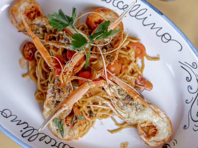 ALABAMA: Gianmarco's Restaurant in Birmingham, ARIZONA: Marcellino Ristorante in Scottsdale, ARKANSAS: Bruno's Little Italy in Little Rock, CONNECTICUT: Mystic Pizza in Mystic, DELAWARE: Mrs. Robino's in Wilmington, FLORIDA: Christini's Ristorante Italiano in Orlando, GEORGIA: La Grotta Ristorante Italiano in Buckhead, Atlanta, HAWAII: Arancino in Honolulu, IDAHO: Luciano's Italian Restaurant in Boise, ILLINOIS: The Village in Chicago, INDIANA: Iaria's Italian Restaurant in Indianapolis, IOWA: Tumea &amp; Sons in Des Moines, KANSAS: Garozzo's in Kansas City, KENTUCKY: Pompilio's in Newport, LOUISIANA: Pascal's Manale in New Orleans, MAINE: Via Vecchia in Portland, MARYLAND: Il Pizzico in Rockville, MASSACHUSETTS: Regina Pizzeria in Boston, MICHIGAN: Buddy's Pizza in Detroit, MINNESOTA: Yarusso Bros in St. Paul, MISSISSIPPI: Giardina's Restaurant in Greenwood, MISSOURI: Jasper's Italian Restaurant in Kansas City, NEBRASKA: Orsi's Italian Bakery &amp; Pizzeria in Omaha, NEVADA: Piero's Italian Cuisine in Las Vegas, NEW HAMPSHIRE: The Rosa in Portsmouth, NEW MEXICO: Trombino's Bistro Italiano in Albuquerque, NEW YORK: Lombardi's in New York City, NORTH CAROLINA: Amedeo's Italian Restaurant in Raleigh, NORTH DAKOTA: Spaghetti Western in Fargo, OHIO: Guarino's in Cleveland, OKLAHOMA: Pete's Place in Krebs, OREGON: Nostrana in Portland, PENNSYLVANIA: The Victor Café in Philadelphia, RHODE ISLAND: Camille's in Providence, SOUTH CAROLINA: Villa Tronco in Columbia, SOUTH DAKOTA: Maribella Ristorante in Sioux Falls, TEXAS: Rosie Cannonball in Houston, UTAH: Valter's Osteria in Salt Lake City, VERMONT: Sarducci's in Montpelier, VIRGINIA: Luigi's Italian Gourmet in Roanoke, WASHINGTON: The Pink Door in Seattle, WEST VIRGINIA: Fazio's Italian Restaurant in Charleston, WISCONSIN: Calderone Club in Milwaukee, WYOMING: Calico Restaurant and Bar in Jackson