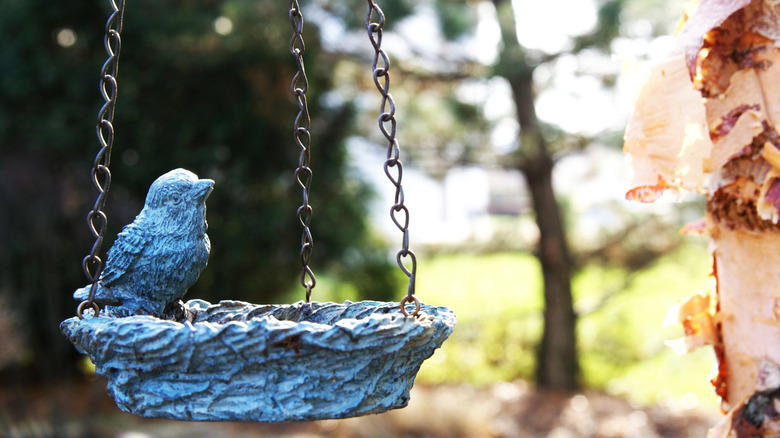 Repurpose found objects, Make use of a tree stump, Build an in ground pool, Suspend baths from low hanging branches, Upcycle an old sink, Pop a margarita glass into your planter, Repurpose an old ice cream parlor chair, Transform candlesticks or vintage lamps, Give new life to a galvanized wash tub