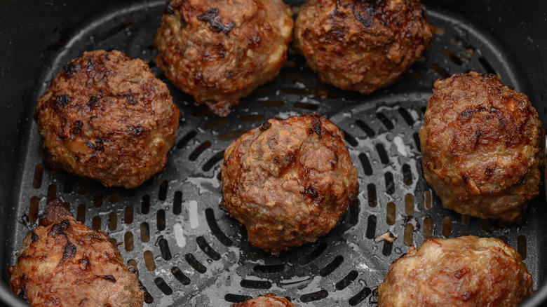 1. Cook them in grape jelly for a sweet and savory snack, 2. Stuff frozen meatballs into a sandwich, 3. Use frozen meatballs as taco filling, 4. Combine them with pineapple and peppers for a sweet and sour dish, 5. Serve frozen meatballs with gravy on top of mashed potatoes, 6. Pile them onto a pizza, 7. Add frozen meatballs to veggie soup to bulk up the dish, 8. Air fry meatballs for a crispy bite, 9. Make bite-sized sliders for your next party, 10. Bake frozen meatballs into a casserole for a hearty dinner, 11. Stuff the meatballs in pasta shells, 12. Cook them in a curry sauce to maximize flavor, 13. Add them to French onion soup
