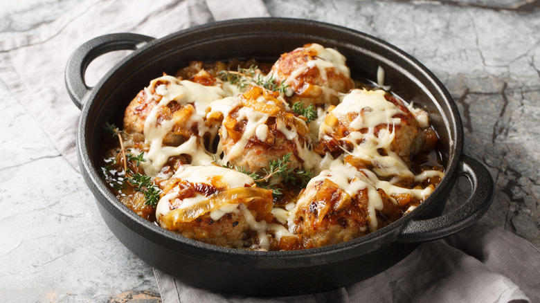 1. Cook them in grape jelly for a sweet and savory snack, 2. Stuff frozen meatballs into a sandwich, 3. Use frozen meatballs as taco filling, 4. Combine them with pineapple and peppers for a sweet and sour dish, 5. Serve frozen meatballs with gravy on top of mashed potatoes, 6. Pile them onto a pizza, 7. Add frozen meatballs to veggie soup to bulk up the dish, 8. Air fry meatballs for a crispy bite, 9. Make bite-sized sliders for your next party, 10. Bake frozen meatballs into a casserole for a hearty dinner, 11. Stuff the meatballs in pasta shells, 12. Cook them in a curry sauce to maximize flavor, 13. Add them to French onion soup