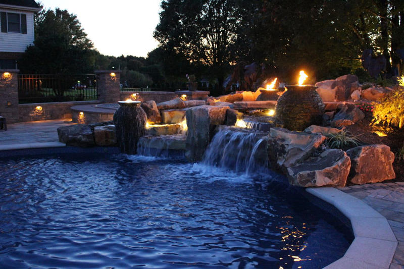 Rustic Campfire Elegance, Combine Purpose, Enhance Summer Blues, Renovate a Deck, Make a Homey Splash, Full Outdoor Dining, Bring the PGA to You, Build-In Your Seating, Transform Greenhouse Sitting, Create a Courtyard, Install a Fountain, Pave the Way, Design a Home While At Home, Elevate Your Pool, Decorate a Pergola, Entrance the Side, Sit Amongst the Trees, Edge Your Flowerbed, Place Seating in the Garden, Install Serenity