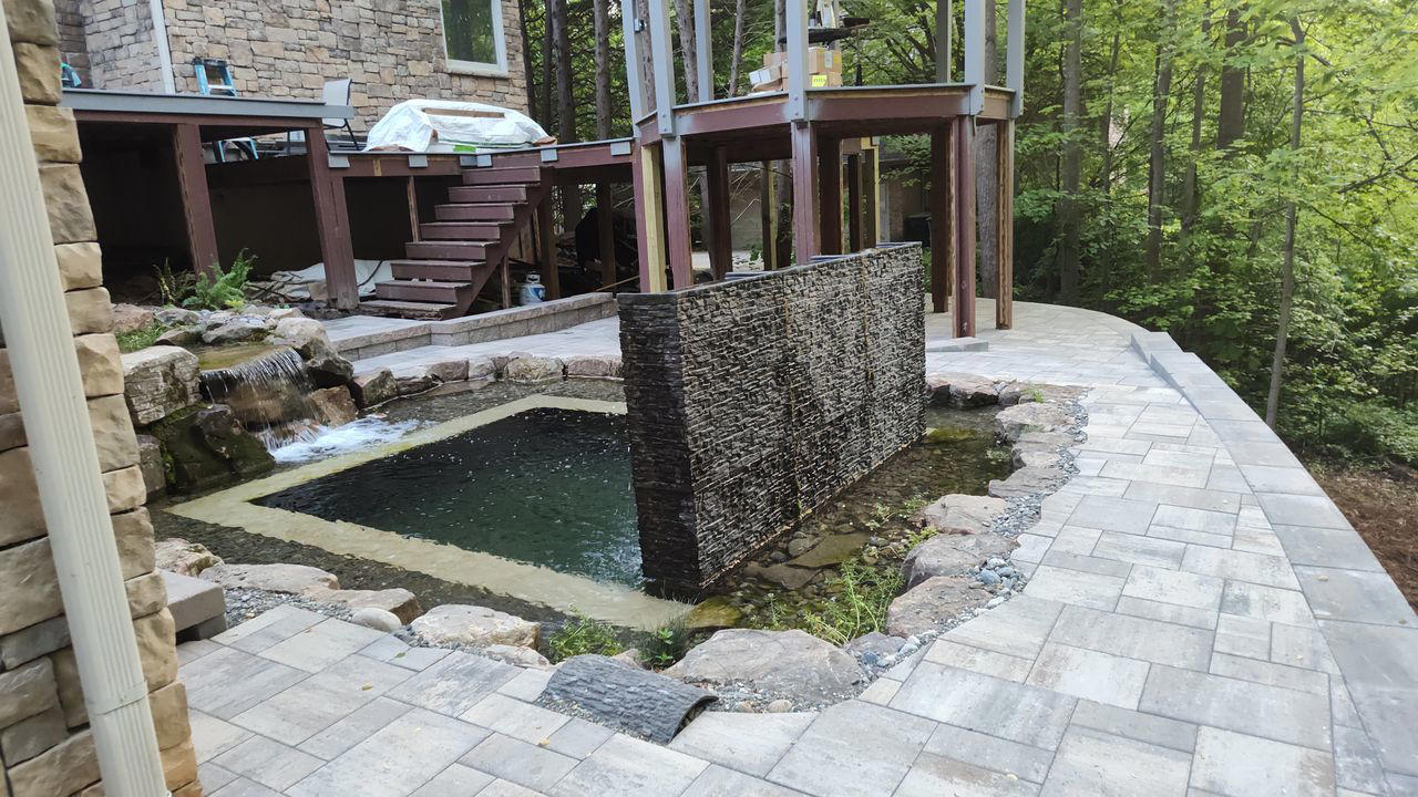 Rustic Campfire Elegance, Combine Purpose, Enhance Summer Blues, Renovate a Deck, Make a Homey Splash, Full Outdoor Dining, Bring the PGA to You, Build-In Your Seating, Transform Greenhouse Sitting, Create a Courtyard, Install a Fountain, Pave the Way, Design a Home While At Home, Elevate Your Pool, Decorate a Pergola, Entrance the Side, Sit Amongst the Trees, Edge Your Flowerbed, Place Seating in the Garden, Install Serenity