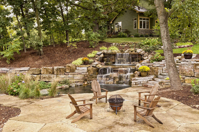 Rustic Campfire Elegance, Combine Purpose, Enhance Summer Blues, Renovate a Deck, Make a Homey Splash, Full Outdoor Dining, Bring the PGA to You, Build-In Your Seating, Transform Greenhouse Sitting, Create a Courtyard, Install a Fountain, Pave the Way, Design a Home While At Home, Elevate Your Pool, Decorate a Pergola, Entrance the Side, Sit Amongst the Trees, Edge Your Flowerbed, Place Seating in the Garden, Install Serenity