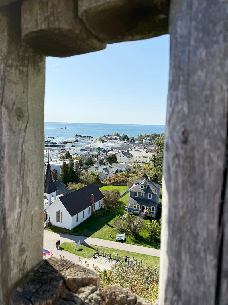 What did Ludington, Mackinac Island win?, What were the other best historic small towns?, Where is Ludington?, When was Ludington settled?, Where is Mackinac Island?, When was Mackinac Island settled?, How can you get to Mackinac Island?