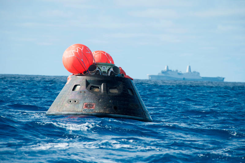 Who is the Michigan sailor assisting Artemis II crew?, What is a Navy hospital corpsman?, What is Artemis II?, When is Artemis II returning?, What does the U.S. Navy's dive medical team do?, Where is the Navy dive medical team now?, What is the USS John P. Murtha?, Artemis II tracker map live