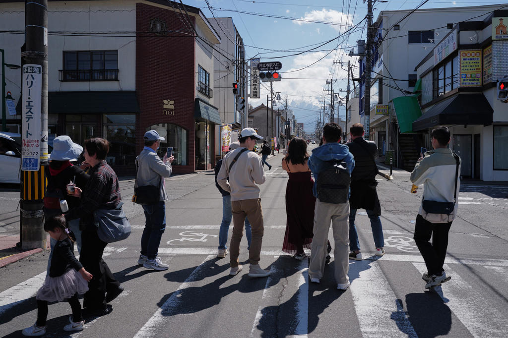10,000 tourists a day 'threaten residents' daily lives', ‘Tourism pollution’ across Japan, Locals find the tourism ‘good but annoying’, Tourists enjoy the view and culture, despite crowds, Overtourism dividing residents