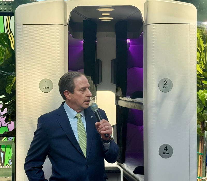 You must be 15 or older. The Skynest will be located in the middle of the plane., It features curtains, power, and a seatbelt., Flyers get soft linens and an amenity kit., I'd prefer the bottom or middle bunks., Flyers will eat before or after their block., You must be 15 or older., I'd book the Skynest to fight jet lag., The Skynest is ANZ's second economy bed.