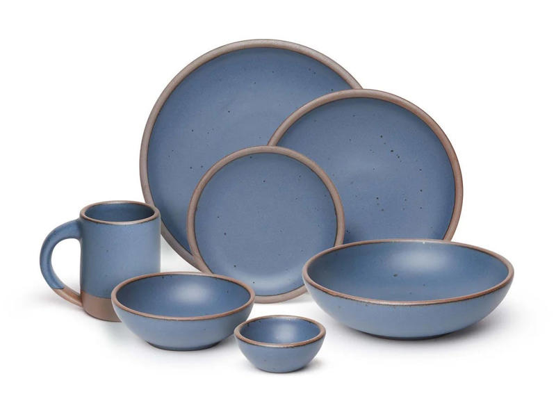 A nice set of dinnerware A starter watch, A pillow that pays homage to their alma mater, A stylish suitcase, A nice set of dinnerware, A history of their favorite football team, A set of glasses full of school spirit, The newest AirPods, A pleasant way to wake up every day, A toiletry bag to use at home or for travel, A fancy messenger bag, A made-to-measure suit, A handheld massager, A pair of joggers he can wear anywhere, A must-read financial guide book, A food delivery gift card, A customized business card holder, A wireless charging pad, An even easier way to make pasta, A durable mug made for camping and beyond, A new skincare routine, A small but powerful speaker, A speaker that talks to you, A fun mug, An Amazon gift card