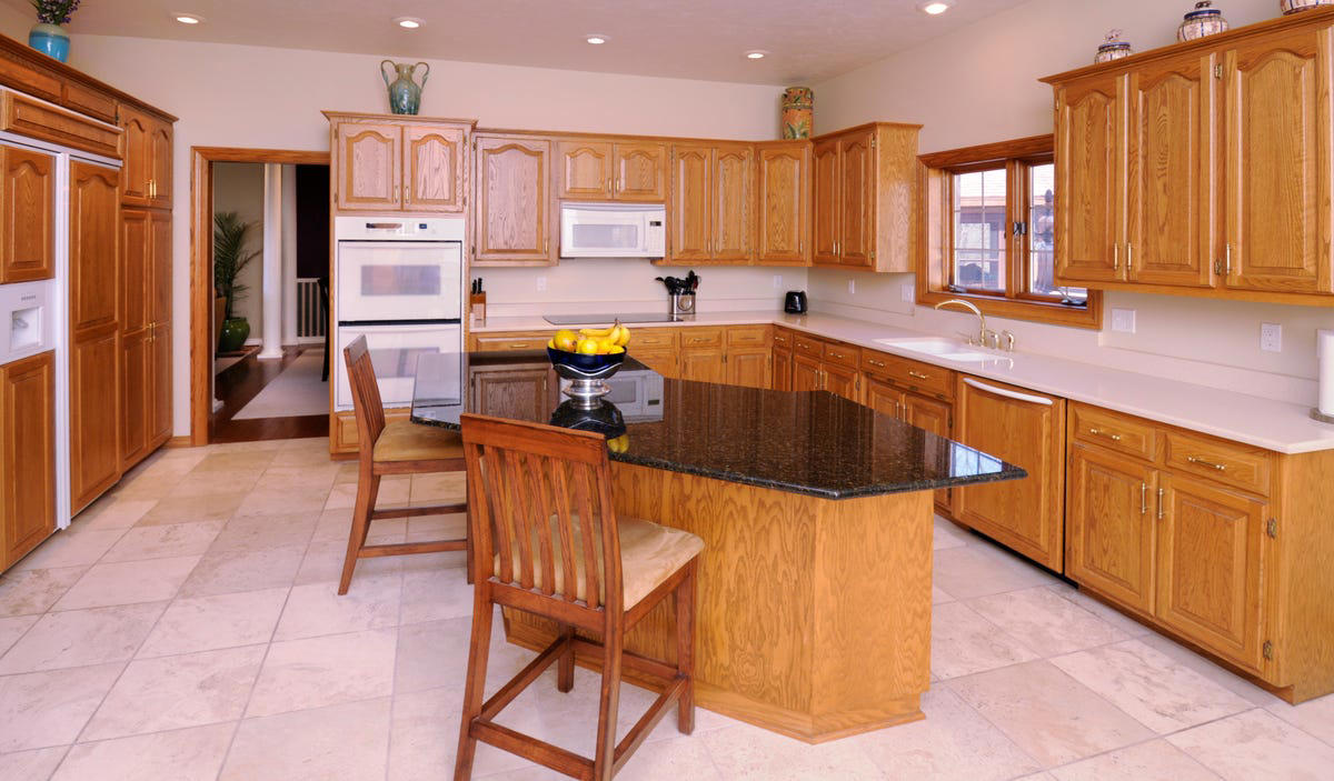 Windsor Counter Stools, Oversize Cabinet Hardware, Distressed Cabinets, Granite Countertops, Crammed Cabinetry, Appliances on the Counter, Magnet-Packed Fridge, Excess Open Shelving, Word Art, All-White Appliances, Glass Mosaic Tiles, Too Much Clutter, Honey Oak Cabinets, Awkward Light Fixtures, Too Much Rustic Texture, Tuscan-Style Kitchens