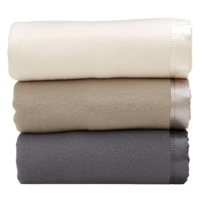 Essential bedding layers, Optional bedding layers, What is a bed skirt?, Decorative cushions, How to layer bedding like an expert, How often to clean bedding, How often to clean pillows and mattress protectors, How to store bedding, Best bedding colours, How to style patterned bedding