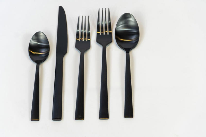 1. Chef's Knife, 2. Black Plastic Utensils, 3. Fruit-Flavored Juice, 4. Can Openers, 5. Aluminum Foil and Plastic Wrap