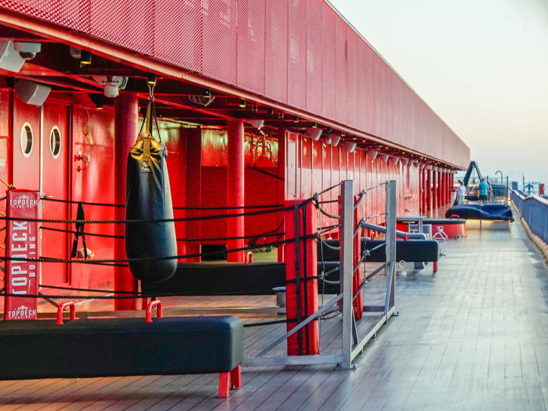 I think you can get a more fun workout upstairs on deck 16. Upstairs, deck seven is a gamer's paradise., Deck seven also has an outdoor lounge known as the Dock., Decks eight to 14 hold nothing but staterooms., There was also a gym in the indoor portion of deck 15., I think you can get a more fun workout upstairs on deck 16., ... and a wide variety of games and sports, like a giant chessboard.