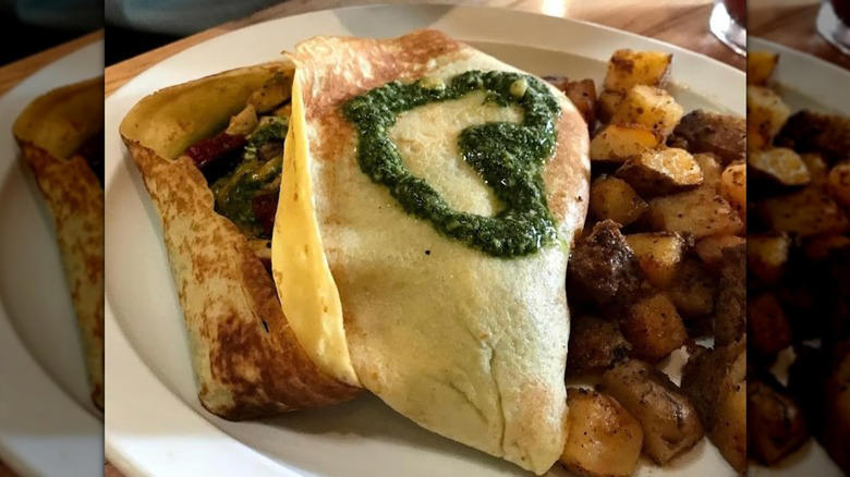 Alabama: Panini Pete's, Alaska: In Bocca al Lupo, Arizona: Matt's Big Breakfast, Arkansas: The Root Cafe, California: Jitlada, Colorado: Foolish Craig's Cafe, Connecticut: Super Duper Weenie, Delaware: Mrs. Robino's, Florida: Se7enBites, Georgia: The General Muir, Hawaii: Star Noodle, Idaho: Westside Drive-In, Illinois: Smoque BBQ, Indiana: Triple XXX Family Restaurant, Iowa: Smokey D's BBQ, Kansas: Jarocho, Kentucky: Momma's Mustard, Pickles & BBQ, Louisiana: Turkey and the Wolf, Maine: A1 Diner, Maryland: Miss Shirley's Cafe, Massachusetts: Sam LaGrassa's, Michigan: Supino Pizzeria, Minnesota: Pizzeria Lola, Mississippi: The Shed Barbeque & Blues Joint, Missouri: The Shaved Duck, Montana: Storm Castle Cafe, Nebraska: Big Mama's Kitchen & Catering, Nevada: John Mull's Meats & Road Kill Grill, New Hampshire: The Tuckaway Tavern & Butchery, New Jersey: La Isla Restaurant, New Mexico: Jambo Café, New York: Kesté Pizza y Vino, North Carolina: Pinky's Westside Grill, North Dakota: Nichole's Fine Pastry & Cafe, Ohio: Momo Ghar, Oklahoma: Cattlemen's Steakhouse, Oregon: Matt's BBQ, Pennsylvania: Hardena, Rhode Island: Aunt Carrie's, South Carolina: The Glass Onion, South Dakota: Bread & Circus Sandwich Kitchen, Tennessee: Arnold's Country Kitchen, Texas: Home Slice Pizza, Utah: Red Iguana, Vermont: Taco Gordo, Virginia: ZZQ, Washington: Voula's Offshore Cafe, West Virginia: Hillbilly Hot Dogs, Wisconsin: Anchor Bar and Grill, Wyoming: Cafe Genevieve, Methodology