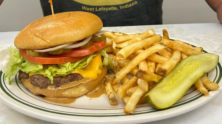 Alabama: Panini Pete's, Alaska: In Bocca al Lupo, Arizona: Matt's Big Breakfast, Arkansas: The Root Cafe, California: Jitlada, Colorado: Foolish Craig's Cafe, Connecticut: Super Duper Weenie, Delaware: Mrs. Robino's, Florida: Se7enBites, Georgia: The General Muir, Hawaii: Star Noodle, Idaho: Westside Drive-In, Illinois: Smoque BBQ, Indiana: Triple XXX Family Restaurant, Iowa: Smokey D's BBQ, Kansas: Jarocho, Kentucky: Momma's Mustard, Pickles & BBQ, Louisiana: Turkey and the Wolf, Maine: A1 Diner, Maryland: Miss Shirley's Cafe, Massachusetts: Sam LaGrassa's, Michigan: Supino Pizzeria, Minnesota: Pizzeria Lola, Mississippi: The Shed Barbeque & Blues Joint, Missouri: The Shaved Duck, Montana: Storm Castle Cafe, Nebraska: Big Mama's Kitchen & Catering, Nevada: John Mull's Meats & Road Kill Grill, New Hampshire: The Tuckaway Tavern & Butchery, New Jersey: La Isla Restaurant, New Mexico: Jambo Café, New York: Kesté Pizza y Vino, North Carolina: Pinky's Westside Grill, North Dakota: Nichole's Fine Pastry & Cafe, Ohio: Momo Ghar, Oklahoma: Cattlemen's Steakhouse, Oregon: Matt's BBQ, Pennsylvania: Hardena, Rhode Island: Aunt Carrie's, South Carolina: The Glass Onion, South Dakota: Bread & Circus Sandwich Kitchen, Tennessee: Arnold's Country Kitchen, Texas: Home Slice Pizza, Utah: Red Iguana, Vermont: Taco Gordo, Virginia: ZZQ, Washington: Voula's Offshore Cafe, West Virginia: Hillbilly Hot Dogs, Wisconsin: Anchor Bar and Grill, Wyoming: Cafe Genevieve, Methodology
