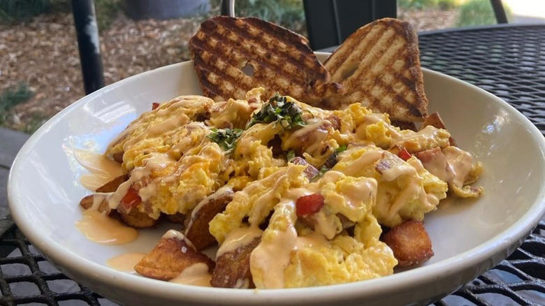 Alabama: Panini Pete's, Alaska: In Bocca al Lupo, Arizona: Matt's Big Breakfast, Arkansas: The Root Cafe, California: Jitlada, Colorado: Foolish Craig's Cafe, Connecticut: Super Duper Weenie, Delaware: Mrs. Robino's, Florida: Se7enBites, Georgia: The General Muir, Hawaii: Star Noodle, Idaho: Westside Drive-In, Illinois: Smoque BBQ, Indiana: Triple XXX Family Restaurant, Iowa: Smokey D's BBQ, Kansas: Jarocho, Kentucky: Momma's Mustard, Pickles & BBQ, Louisiana: Turkey and the Wolf, Maine: A1 Diner, Maryland: Miss Shirley's Cafe, Massachusetts: Sam LaGrassa's, Michigan: Supino Pizzeria, Minnesota: Pizzeria Lola, Mississippi: The Shed Barbeque & Blues Joint, Missouri: The Shaved Duck, Montana: Storm Castle Cafe, Nebraska: Big Mama's Kitchen & Catering, Nevada: John Mull's Meats & Road Kill Grill, New Hampshire: The Tuckaway Tavern & Butchery, New Jersey: La Isla Restaurant, New Mexico: Jambo Café, New York: Kesté Pizza y Vino, North Carolina: Pinky's Westside Grill, North Dakota: Nichole's Fine Pastry & Cafe, Ohio: Momo Ghar, Oklahoma: Cattlemen's Steakhouse, Oregon: Matt's BBQ, Pennsylvania: Hardena, Rhode Island: Aunt Carrie's, South Carolina: The Glass Onion, South Dakota: Bread & Circus Sandwich Kitchen, Tennessee: Arnold's Country Kitchen, Texas: Home Slice Pizza, Utah: Red Iguana, Vermont: Taco Gordo, Virginia: ZZQ, Washington: Voula's Offshore Cafe, West Virginia: Hillbilly Hot Dogs, Wisconsin: Anchor Bar and Grill, Wyoming: Cafe Genevieve, Methodology